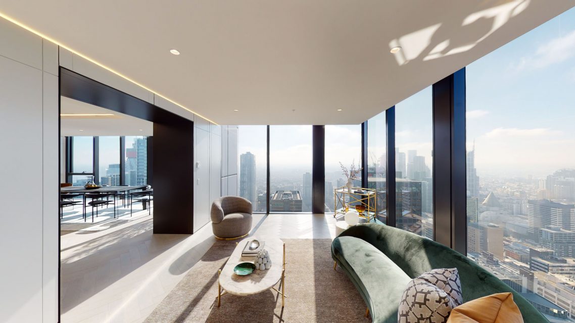 Living area with expansive windows and city views